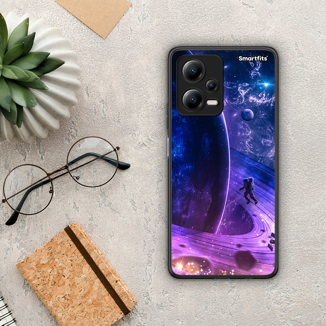 Θήκη Xiaomi Poco X5 5G Dual Lost Astronaut από τη Smartfits με σχέδιο στο πίσω μέρος και μαύρο περίβλημα | Xiaomi Poco X5 5G Dual Lost Astronaut Case with Colorful Back and Black Bezels